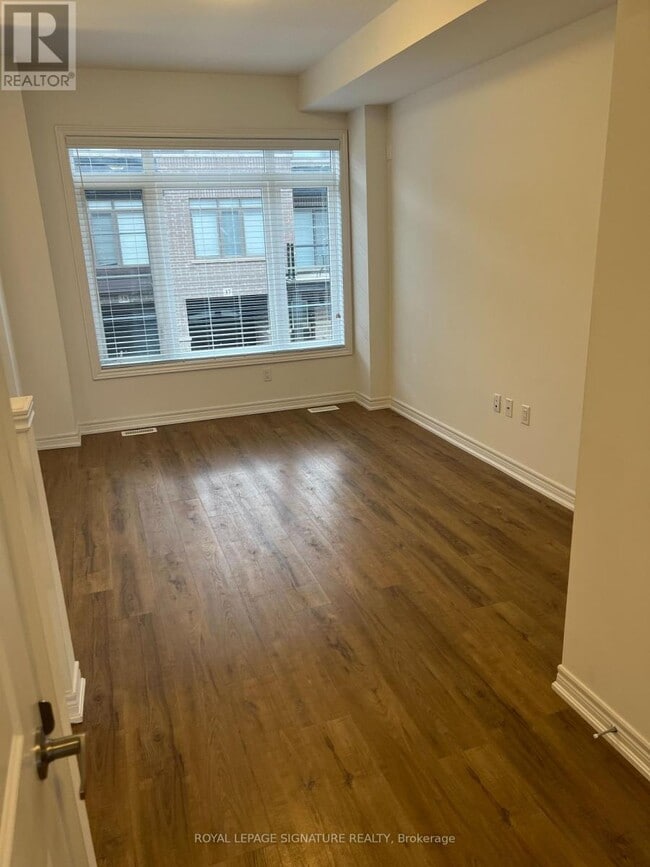 Photo du bâtiment - 575 Woodward Ave