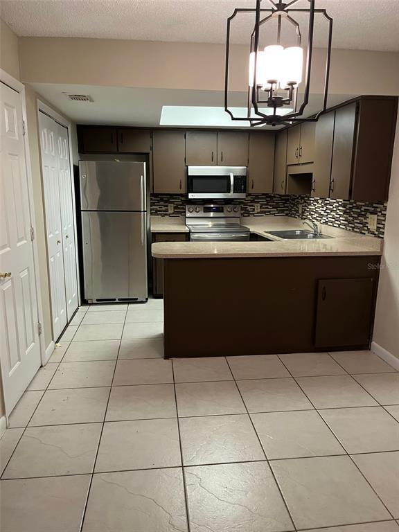 Building Photo - 9 Windtree Ln