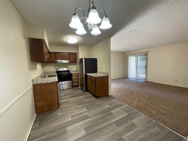 Kitchen/Dining Room/Living Room - Peppertree Apartments