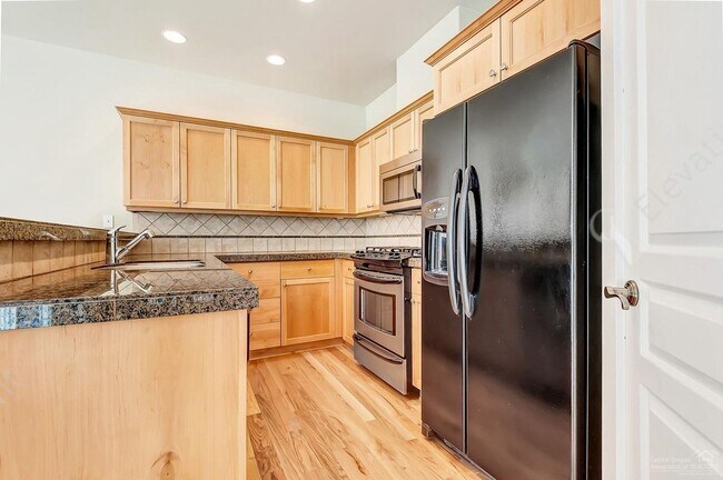 Building Photo - Charming Northwest Crossing Townhome – Ste...