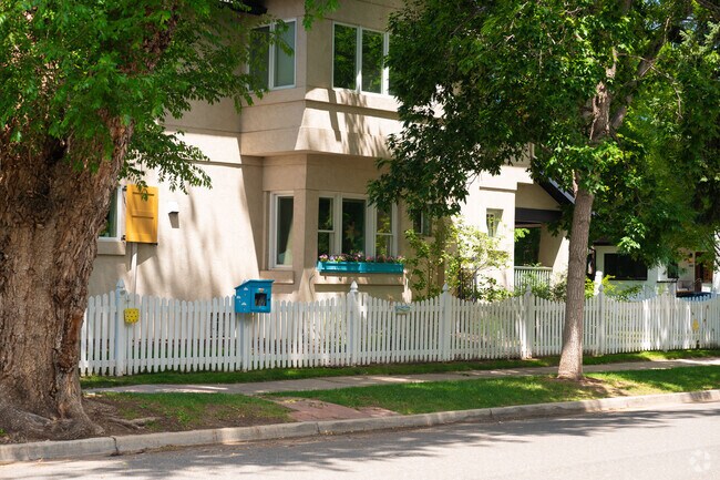 Cute picket fences and tiny libraries are a staple in Washington Park.