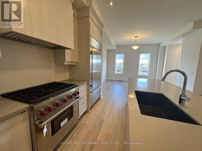 Photo du bâtiment - 9420 Bayview Ave
