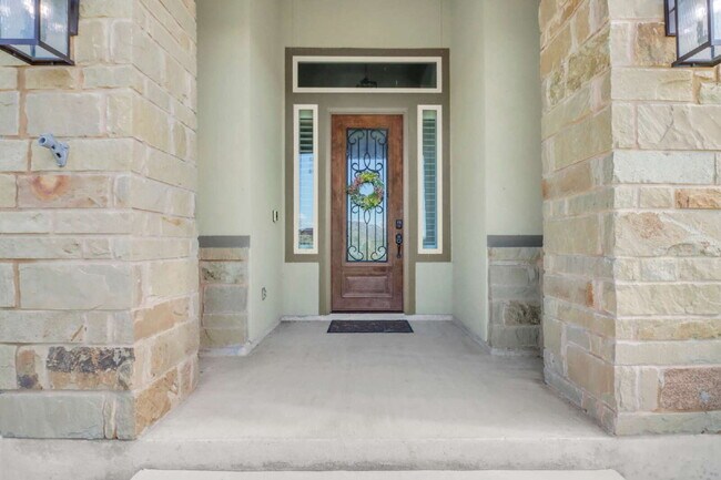 Foto del edificio - "Charming 4-Bed Oasis with Granite Touches & Cozy Fireplace in Floresville!"