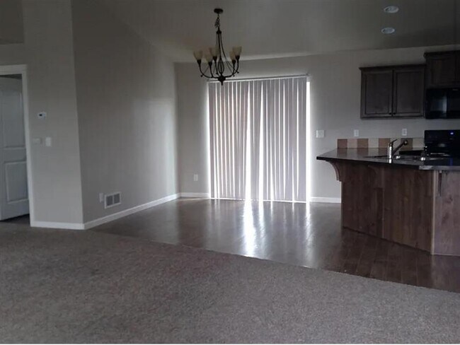 Building Photo - A newer, 5 year old home, with open floor ...