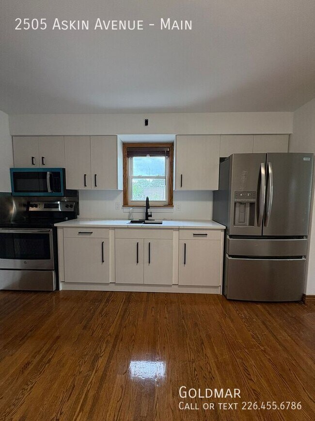 Building Photo - Beautiful Three Bedroom Main Floor Unit