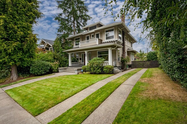 Building Photo - Traditional Four-Corner Craftsman Home on ...