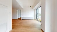 Located at 370 Queens Quay West in Toronto's vibrant waterfront neighbourhood, this well-appointed 3-bedroom, 2-bathroom unit offers a clean, modern aesthetic throughout. Light wood laminate flooring runs continuously across the entire space, creating a warm and cohesive feel from entry to each room.

A bright hallway with sliding storage doors welcomes you inside and leads to the open-concept living and kitchen area. The kitchen is thoughtfully designed with light wood cabinetry, white countertops, stainless steel appliances including a built-in oven and dishwasher, and recessed lighting that adds warmth to the space.

The living area benefits from floor-to-ceiling windows offering striking views of the Toronto skyline and Rogers Centre, flooding the space with natural light. The three bedrooms are bright and functional, with large windows — some featuring corner glazing — that frame city views and invite ample daylight.

The two bathrooms are finished in neutral tones with large-format floor tiles. The primary bathroom features a sleek glass-enclosed walk-in shower, while the second bathroom includes a full soaker tub with an overhead shower and a wood-toned vanity. The overall design is clean, contemporary, and ideally situated for urban Toronto living.