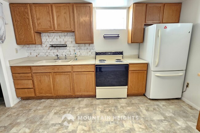 Foto del edificio - 9889 S Poppy Ln