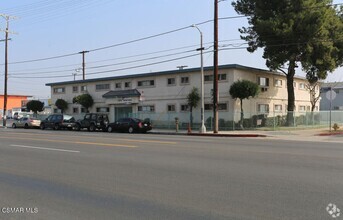 Building Photo - 7460 Woodman Ave
