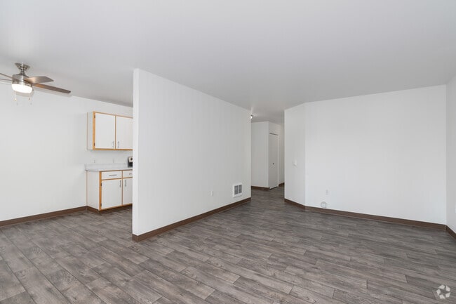 3BR, 2BA - 1,185SF - Living Room - Quatama Village Apartments