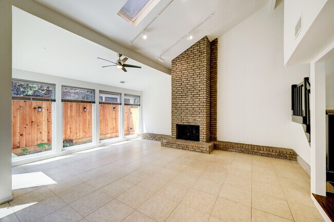 Vaulted ceilings, skylights and a wall of windows wash the living areas with tons of natural light. - 107 Phanturn Ln