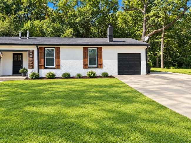 Building Photo - 8850 Woodland Dr