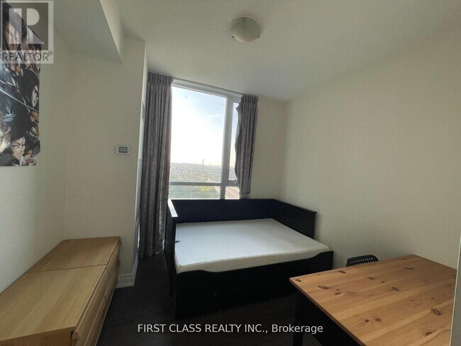 Photo du bâtiment - 339-1339 Rathburn Rd W