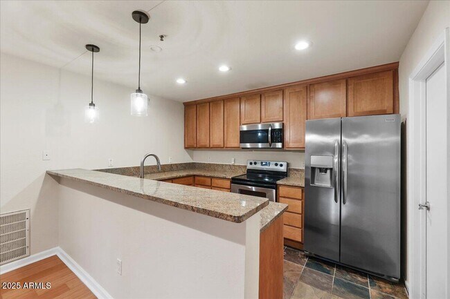 Foto del edificio - 4704 E Paradise Village Pkwy N