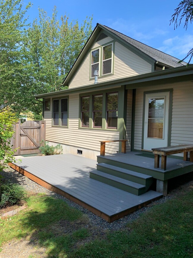 Private entrance through gate to multi-level deck. - 701 N 76th St