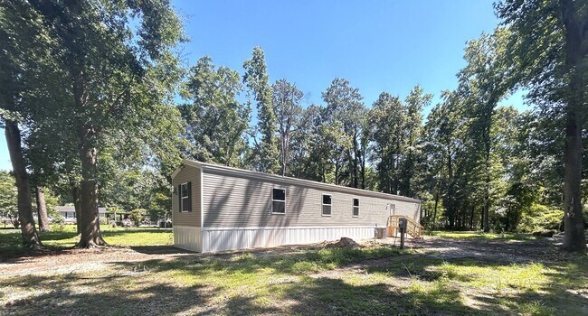 Building Photo - Brand new 4BR Mobile Home - Country living with City convenience!