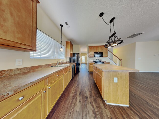 Building Photo - 6828 Championship Dr