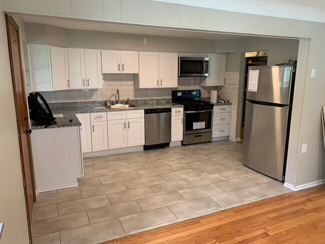Kitchen - new floors, new cabinets, new appliances - 91 Greendale Dr