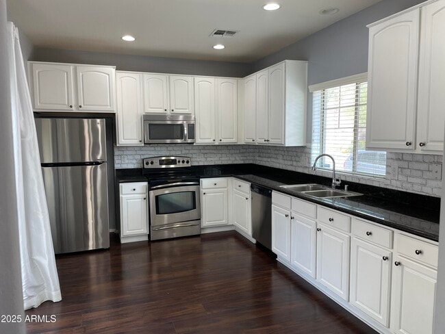Building Photo - 14240 W Country Gables Dr