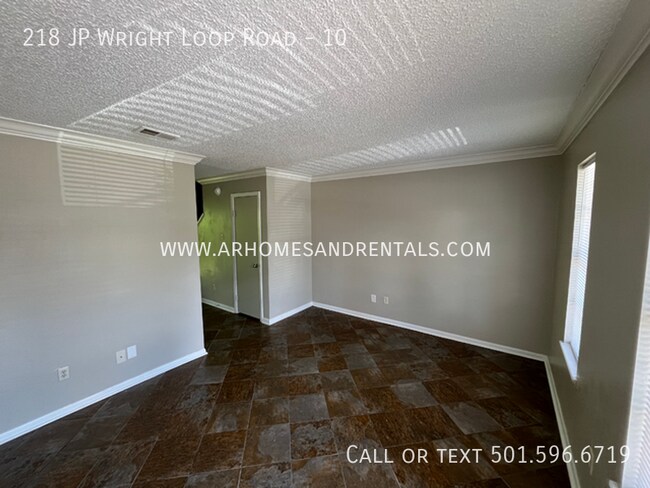 Foto del edificio - 218 N J P Wright Loop Rd