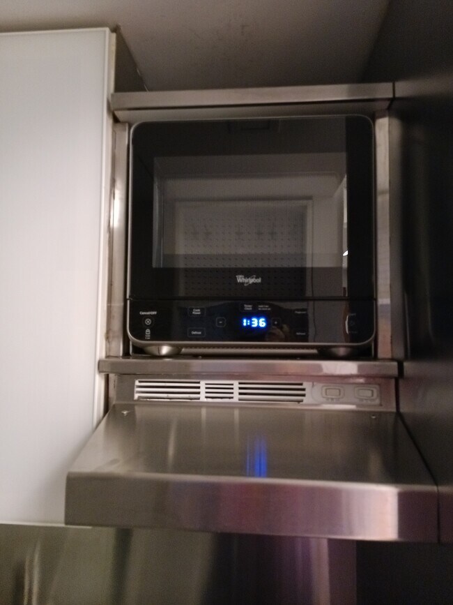 Small Kitchen area / Mini Fridge and electric cook top - 11 E 128th St