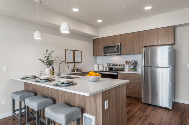 Kitchen With Island - Marquee Apartments