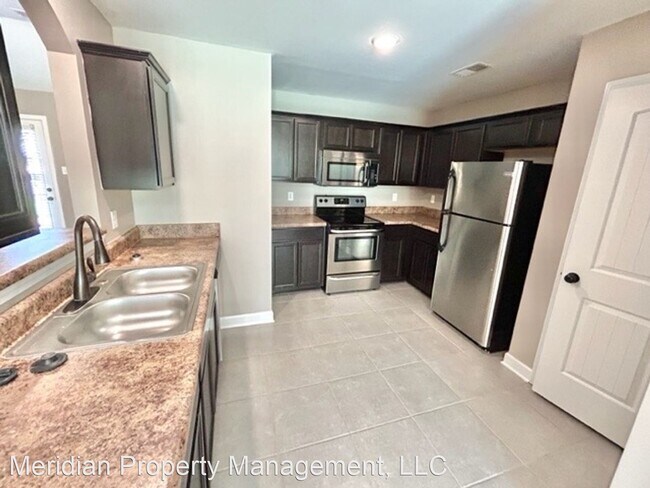Foto del edificio - 4 br, 2 bath Apartment - 7522 Shahkoka Dri...