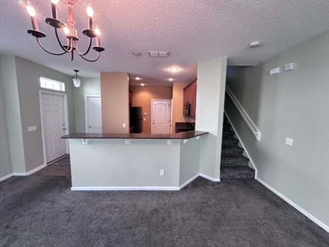 Building Photo - Stylish 3BR Townhome with Garage & Walk-In Closet