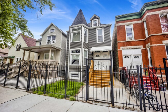 Building Photo - 1821 N Tripp Ave