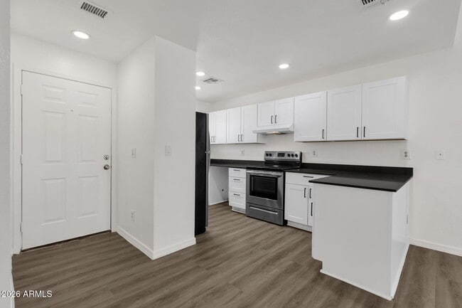 Building Photo - 6454 E University Dr