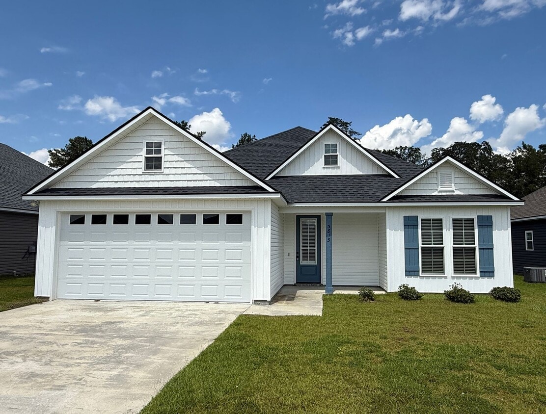 Primary Photo - Stylish 4-Bedroom Home with Screened Porch...