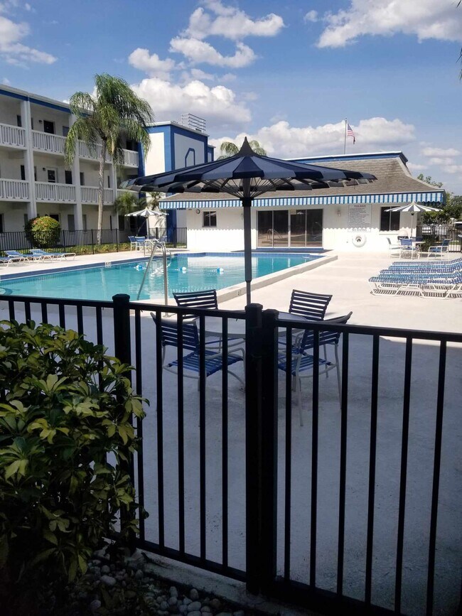 Just 10 steps from your front door to the pool gate! - 350 79th Ave N