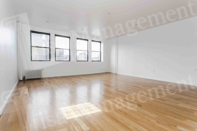 Building Photo - 37-39 W 8th St