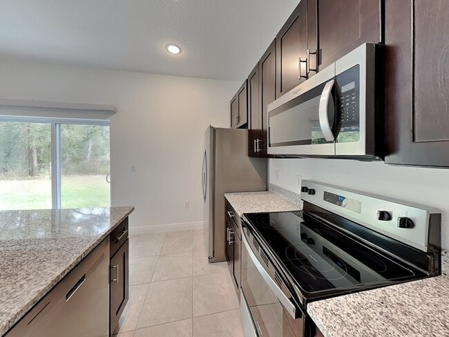 Building Photo - 8809 N Sandree Dr