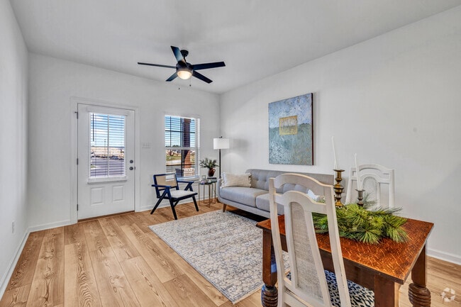 3BR, 2BA - 1,067SF - Living Room/Dining Room - Cottages at Morganfield - Rental Homes