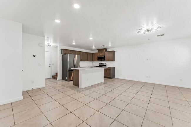 Building Photo - Modern Gated Townhome with Flexible Living Spaces & Stylish Finishes!