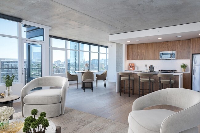 Beautifully designed interiors with high ceilings, oversized windows, and custom roller shades - The Sutton