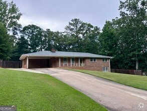 Building Photo - 5506 Woodland Dr