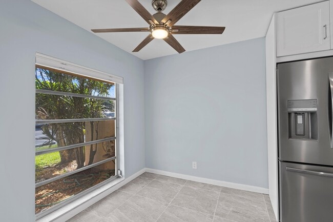 Building Photo - 5750 Princess Palm Ct