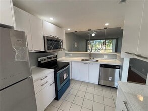 Building Photo - 6000 NW 64th Ave