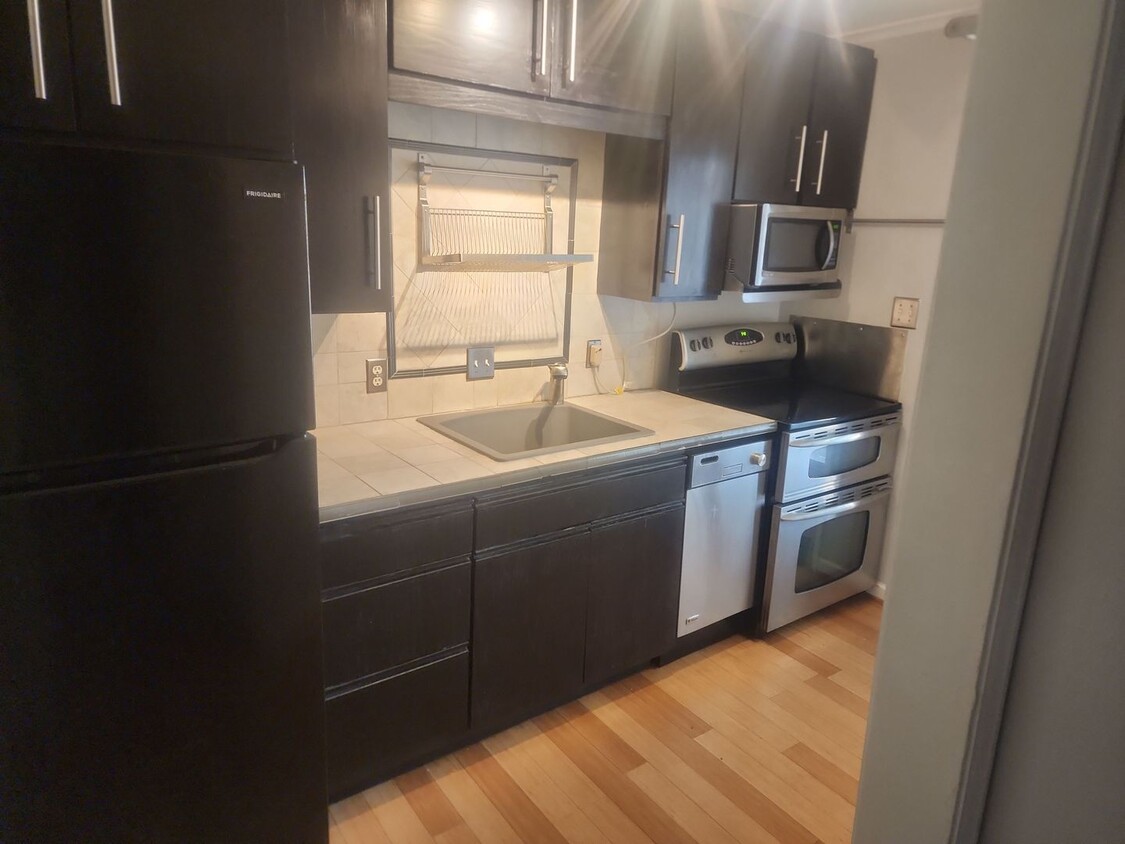 Primary Photo - Downtown Convenience: 1BR, 1BA Modest Condo