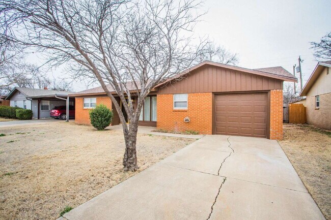 Building Photo - "Charming 3-Bed Retreat in Lubbock with Granite Accents & Spacious Living!"