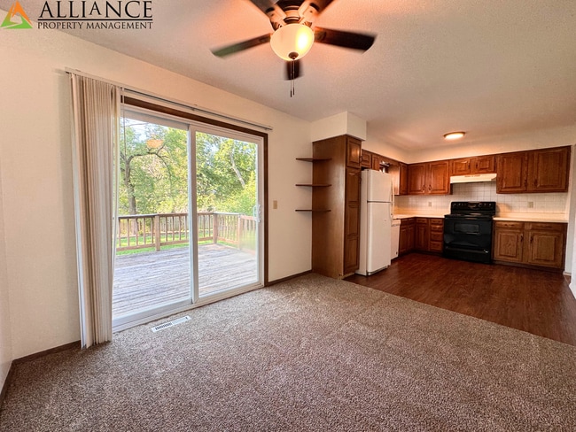 Building Photo - Home with Fenced Yard~Great West Side Loca...