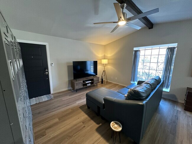 Living Room with Vaulted Ceiling - 4329 E 68th St