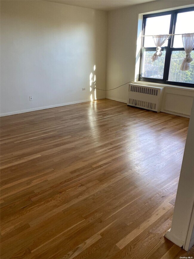 Building Photo - 209-10-209-41 41st Ave