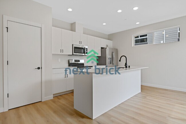 Foto del edificio - Brand-New 2026 Townhome | 3 Bed | 2.5 Bath | 1,560 Sq Ft | EV Garage | A/C Included