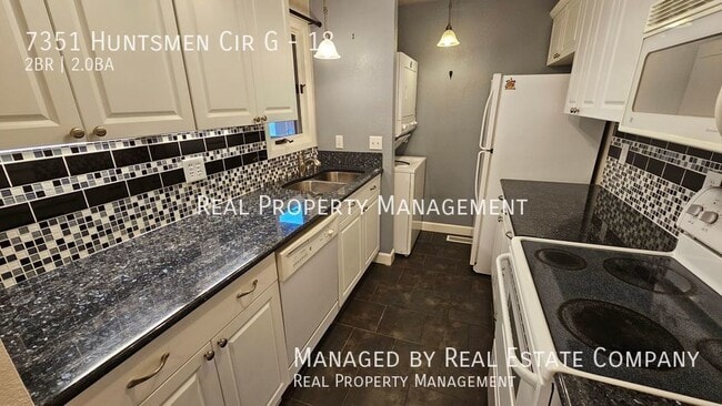 Building Photo - Third Story Two Bedroom Condo with Garage ...