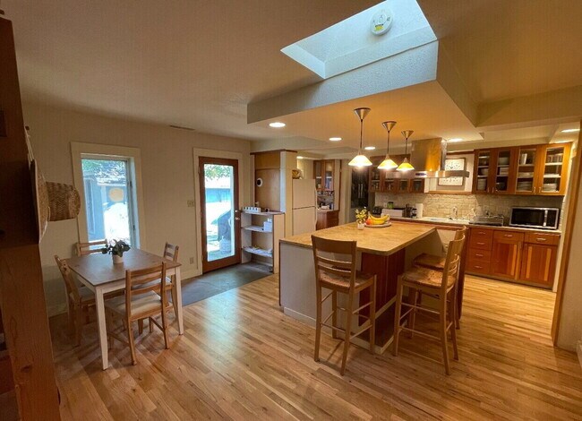 Building Photo - "House on The Hill, Updated and Renovated, Private Fenced Yard – 9th and University!"