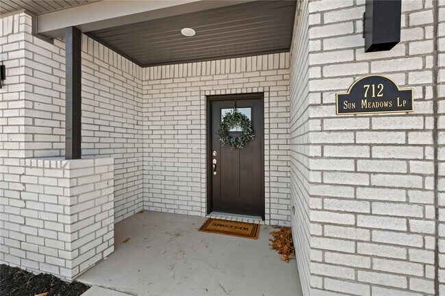 Foto del edificio - 712 Sun Meadows Loop