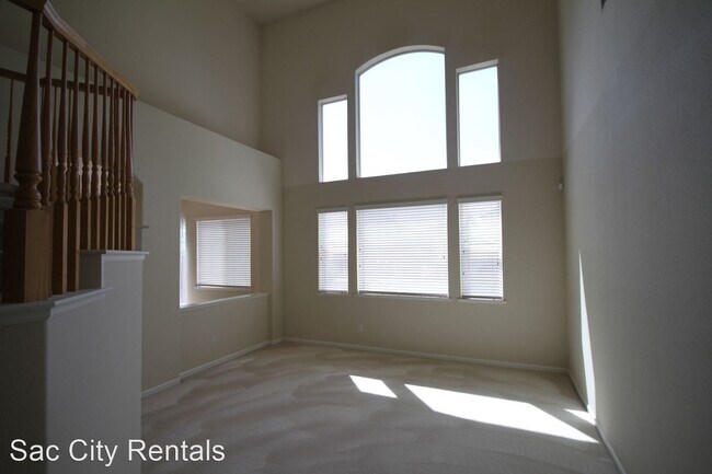 Building Photo - 4 br, 3.5 bath House - 9808 Burrowing Owl Way